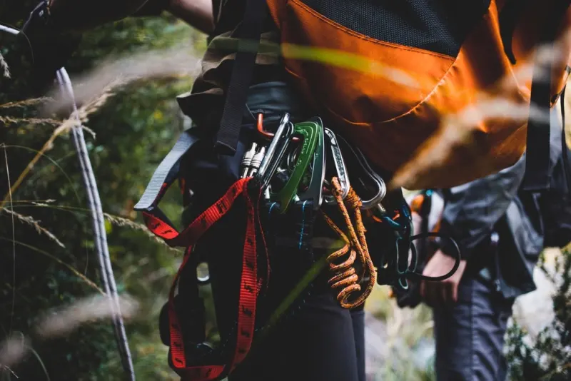 Climbing harness with carabiners and fall-arrest gear